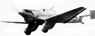 Stuka prototype with twin tail. Note the different nose with the non-inverted Rolls-Royce engine.